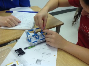 Another student busy building a 3-d coordinate system, this time with the amazing Zometool kit.